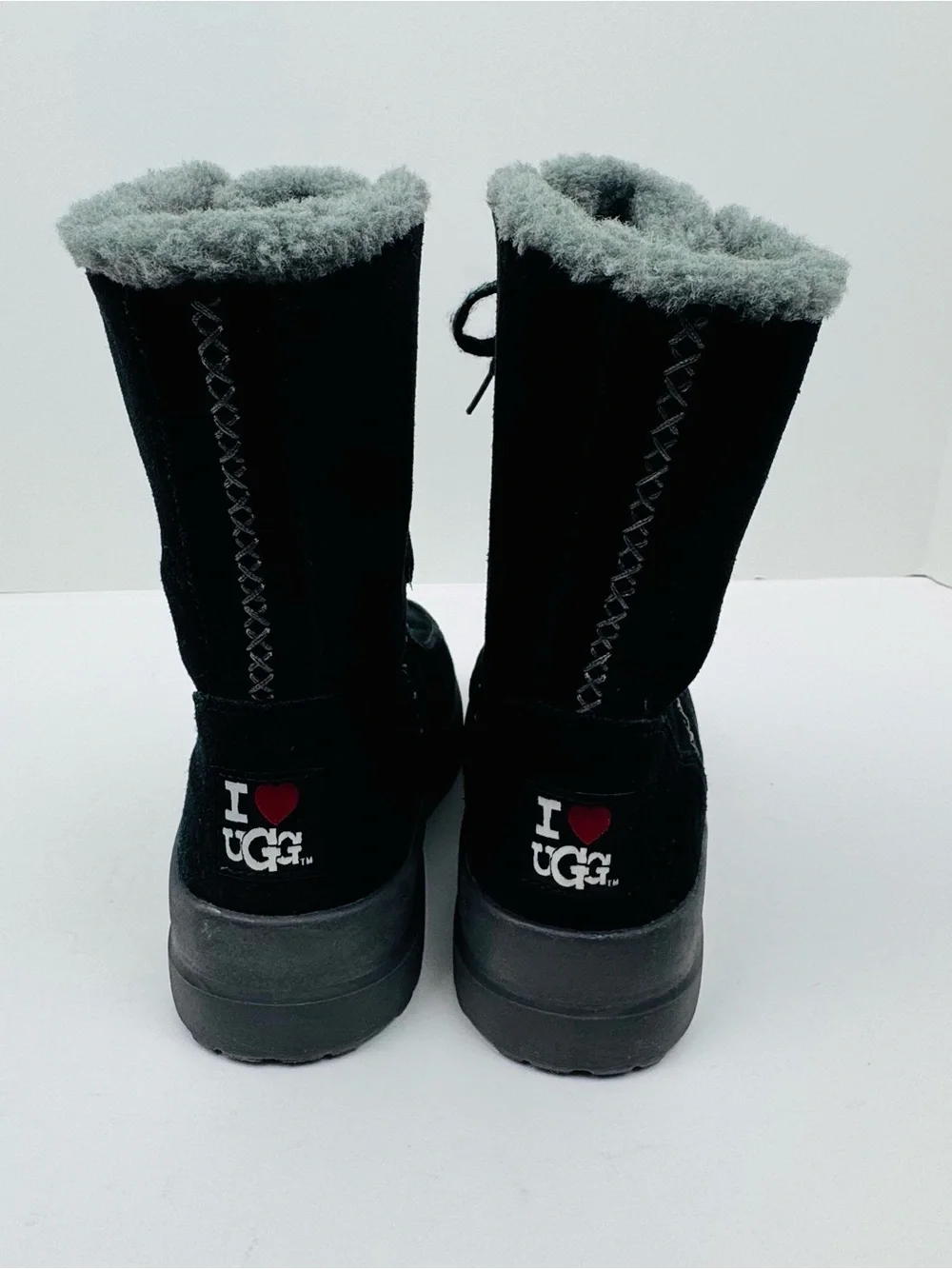 I Heart UGG Youth Black Wool Lined Boots. Size 4. Excellent preowned condition.